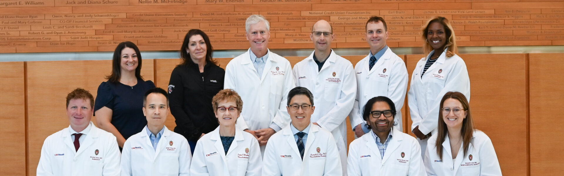 A group of MSK faculty members pose together.