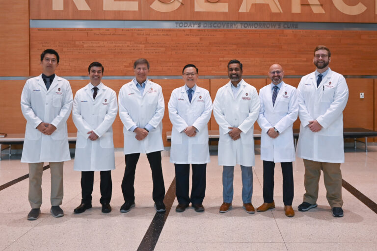 A group of faculty member from the nuclear medicine and molecular imaging section pose together.